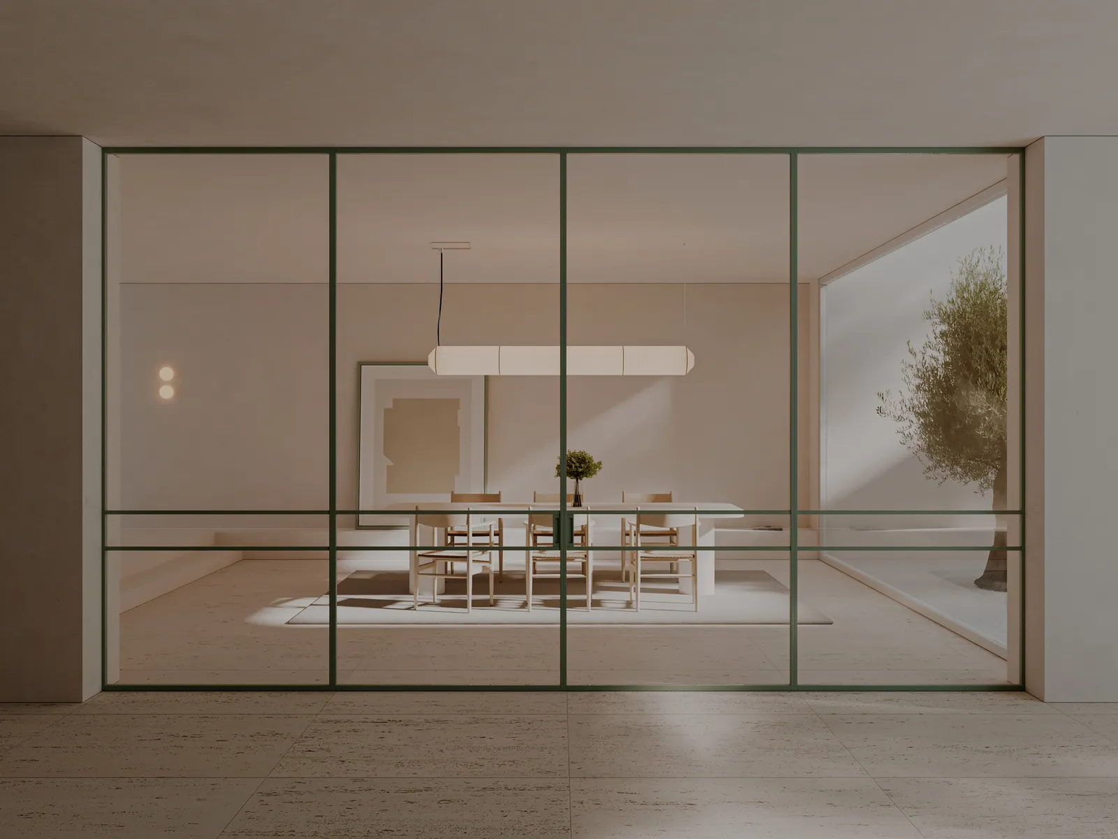 Modelo Soft: cerramiento de vidrio con perfil fino verde delante de un comedor luminoso.